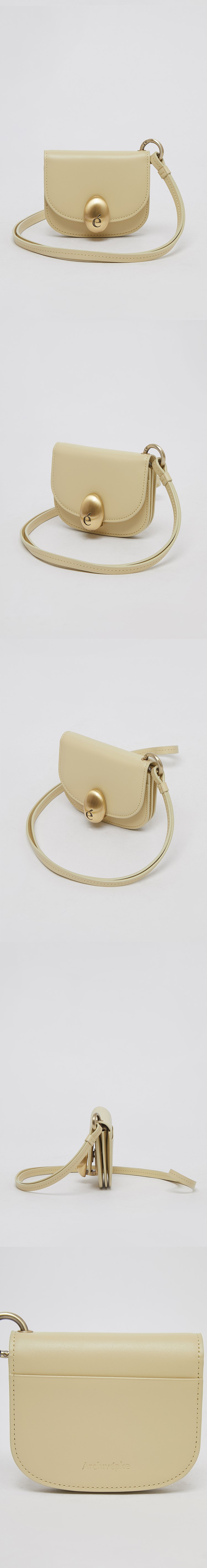 MUSINSA | Archivépke Egg mini wallet(Butter)_OVADX24504BTT